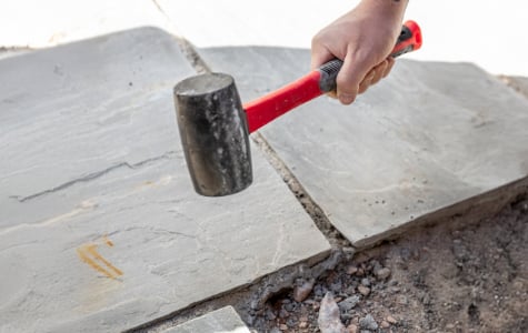 Laying the Sandstone Paving Slabs